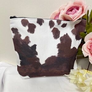 Makeup bag- cow print on canvas, NIP, open interior, 7Hx8.75Lx2D”, great gifts